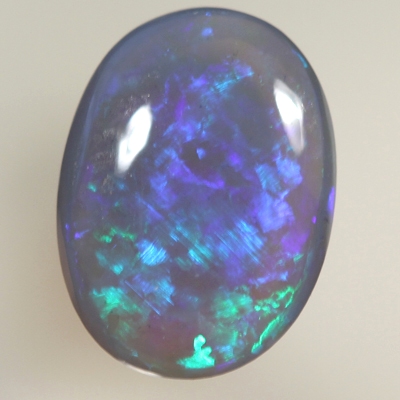 SOLID BLACK CRYSTAL OPAL 8 x 6 mm Crispy bright green over purple